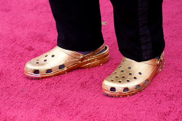 Musician Questlove was pictured wearing a pair of custom gold Crocs at the Oscars. (Photo / Getty)