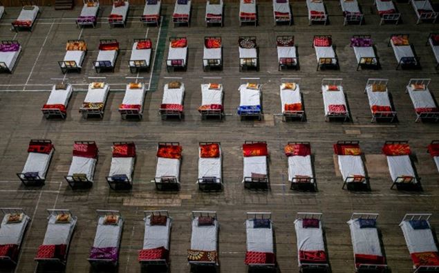 Beds lie inside an indoor stadium converted into COVID-19 treatment center for emergencies in the wake of the spike in the numbers of positive coronavirus cases in Srinagar, Indian controlled Kashmir. (Photo / AP)