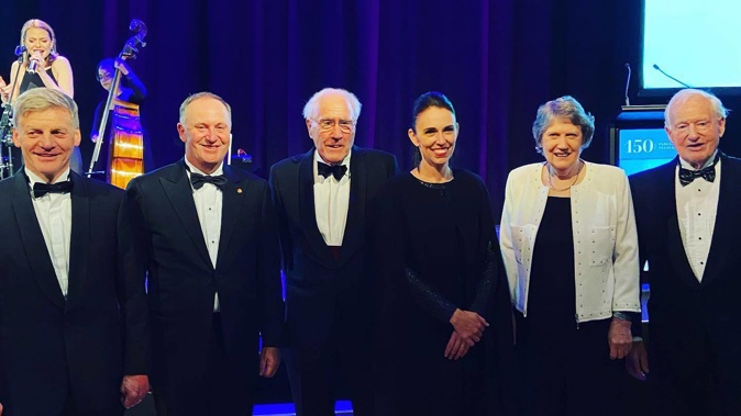 Former Prime Ministers Sir Bill English, Sir John Key, Sir Geoffrey Palmer, Helen Clark and Jim Bolger pose with current Prime Minister Jacinda Ardern. Photo / Supplied