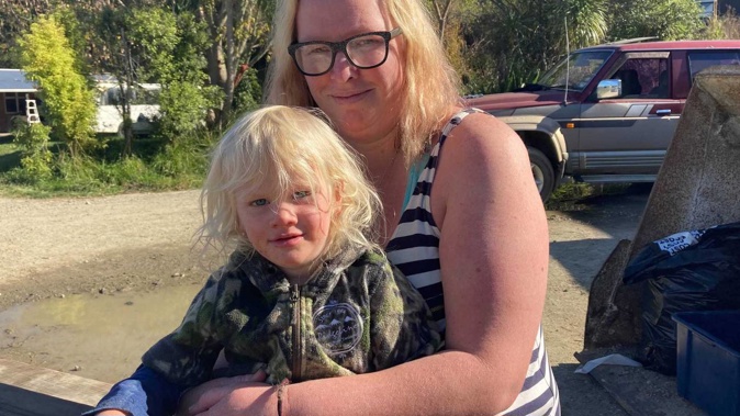 Axle Hamblyn, 3, with mother Haley Allatt. Photo / Luke Kirkness