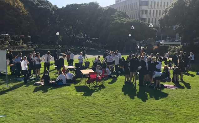 Students setting up at the protest. (Photo / Katie Harris)