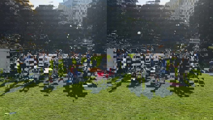 Students setting up at the protest. (Photo / Katie Harris)