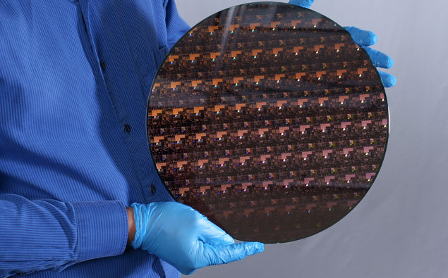 A wafer holding the new 2-nanometer chips developed by IBM. (Photo / CNN)