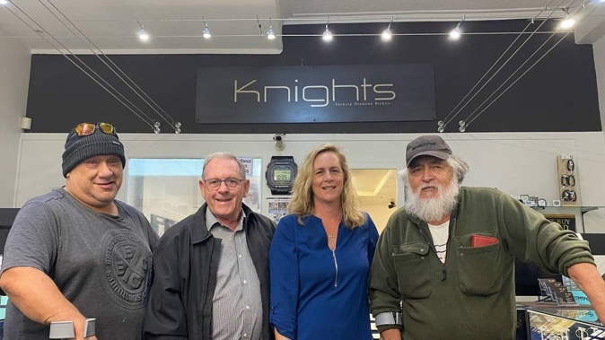 Desmond Moke of Kaitaia, left, and Viv Taupaki from Herekino, right, with Monty Knight, director of Knights the Jewellers and Adeline Knight, managing director, received a donation of $1000 each for their bravery in tackling an alleged robber at the store. 
