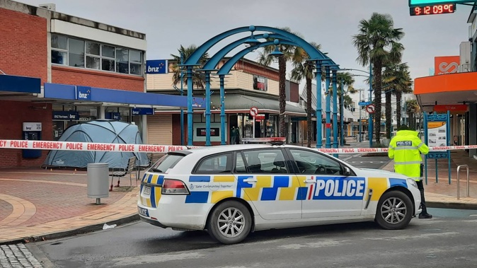 A tent set up at the scene of a fatal stabbing in Blenheim this morning. (Photo / Alan Gibson)