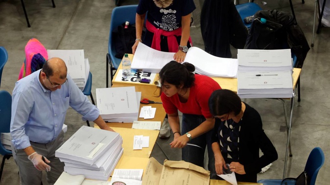 Ballot papers voted by Italians living in Europe, Russia, and Turkey are prepared for the final count in Bologna, Italy on September 25. Photo / AP