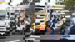 Police loading pallets of beer cans potentially contaminated with methamphetamine from a warehouse on Ryan Pl, Manukau, Auckland. Photo / Jason Oxenham