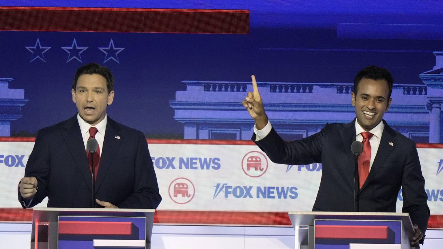Florida Governor Ron DeSantis speaks as businessman Vivek Ramaswamy listens during a Republican presidential primary debate hosted by FOX News Channel. Photo / AP