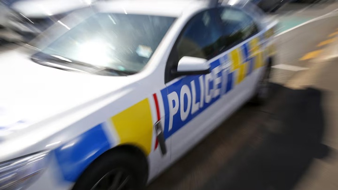 A group with weapons attacked a vehicle in Taradale while the occupant was inside calling police. Photo / Bevan Conley