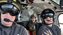 Matt Otto (left) and Tom Otto in the helicopter as they head to fight the Canadian wildfires.