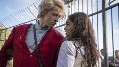 Tom Blyth as Coriolanus Snow and Rachel Zegler as Lucy Gray in a scene from 'The Hunger Games: The Ballad of Songbirds and Snakes.' (Lionsgate via AP)