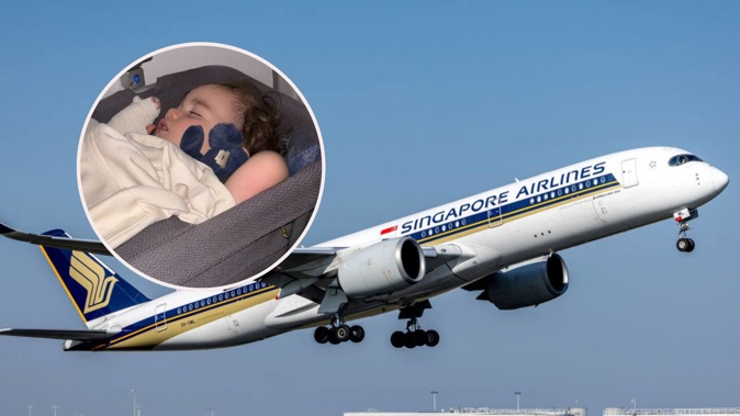 The family were two hours into a flight to Singapore when the injury occurred. Photo / Getty Images and Supplied