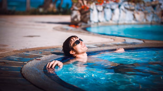 Reports suggest a wiring malfunction caused two travellers to be electrocuted in hot tub, resulting in a death. Photo / 123rf