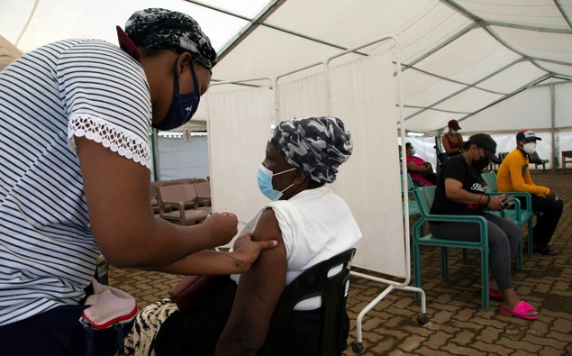 A woman receives a dose of a Covid-19 vaccine at a centre in Soweto, South Africa on November 29. (Photo / AP)