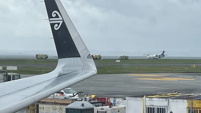 Fire and Emergency was alerted to reports of a plane engine fire at Auckland Airport at 1:20pm. Two fire trucks were in attendance. Photo / Supplied