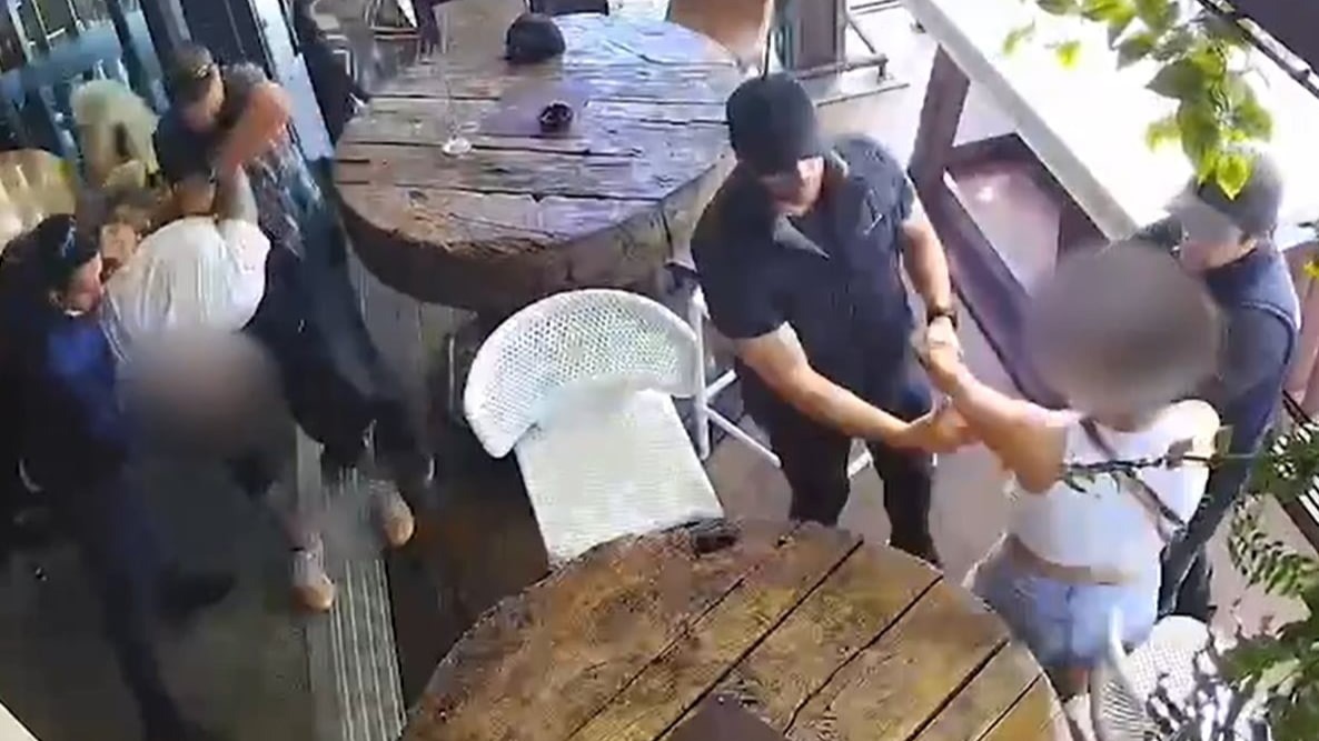 Security camera footage shows police arresting the two kidnapping accused at Auckland Viaduct bar Headquarters. Photo / Supplied