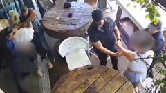 Security camera footage shows police arresting the two kidnapping accused at Auckland Viaduct bar Headquarters. Photo / Supplied