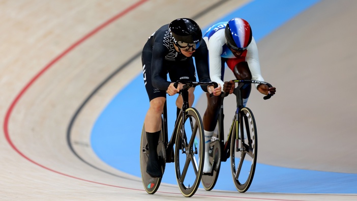 Ellesse Andrews of Team New Zealand and Taky Marie Divine Kouame of Team France compete during the Women's Sprint, 1/16 Finals on day fourteen of the Olympic Games Paris 2024 at Saint-Quentin-en-Yvelines Velodrome on August 09, 2024 in Paris, France. (Photo by Alex Broadway/Getty Images)
