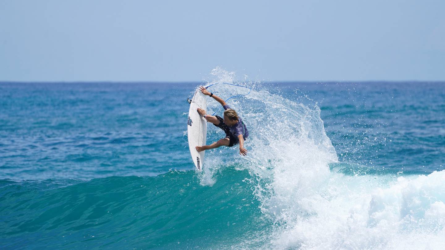 Cooper Roberts catches a wave. Photo / Tamickphoto