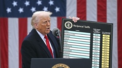 US President Donald Trump holds a chart as he announces his "Liberation Day" tariffs in a move that threatens to ignite a devastating global trade war. Photo / AFP