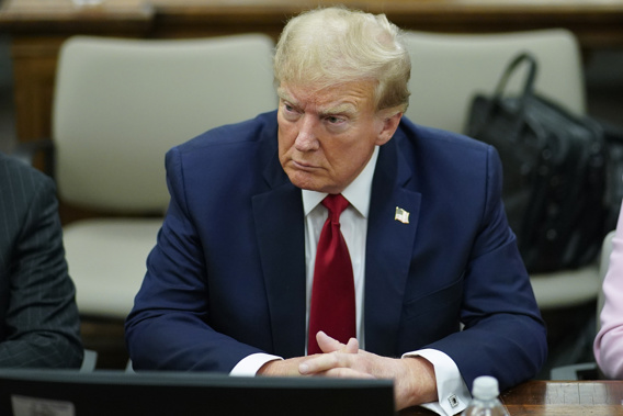 FILE - Former President Donald Trump, center, sits at the defense table with his attorney's Christopher Kise, left, and Alina Habba, at New York Supreme Court, Thursday, Dec. 7, 2023, in New York. (AP Photo/Eduardo Munoz Alvarez, Pool, File)