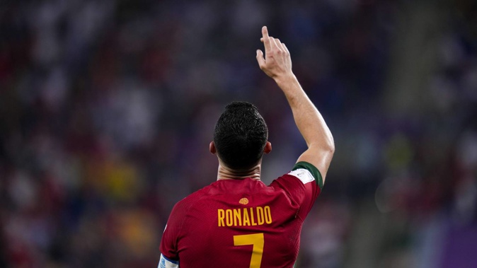 Portugal's Cristiano Ronaldo celebrates after scoring from the penalty spot his side's opening goal against Ghana. Photo / AP