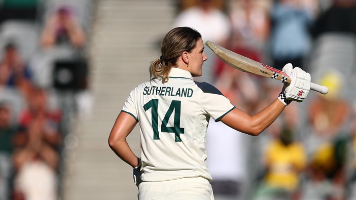 Annabel Sutherland of Australia celebrates scoring a century during day two of the Women's Ashes Test Match between Australia and England at Melbourne Cricket Ground on January 31, 2025 in Melbourne, Australia. (Photo by Morgan Hancock - CA/Cricket Australia via Getty Images)
