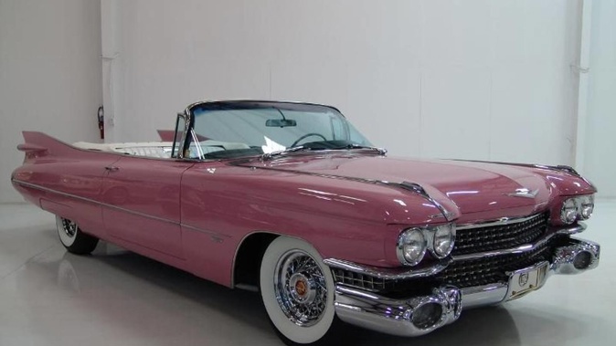 Kim Dotcom's iconic 1959 Elvis Pink Cadillac that was seized during a police raid on his mansion in 2012 is being sold at auction. Photo / Trade Me