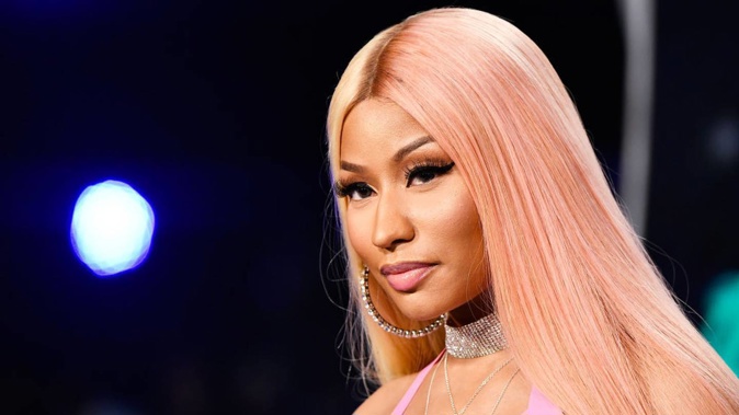 The rapper has come under fire for claiming the vaccine causes "swollen testicles". (Photo / Getty Images)