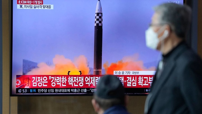 A TV screen at a train station in Seoul, South Korea, shows a news programme reporting on North Korea's ICBM launch. (Photo / AP)