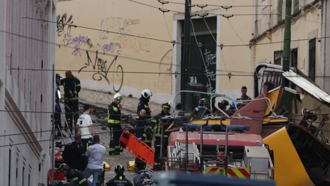Police and firefighters work on the site of the Gloria funicular railway accident in Lisbon, on September 3, 2025. Photo / Patricia de Melo Moreira, AFP