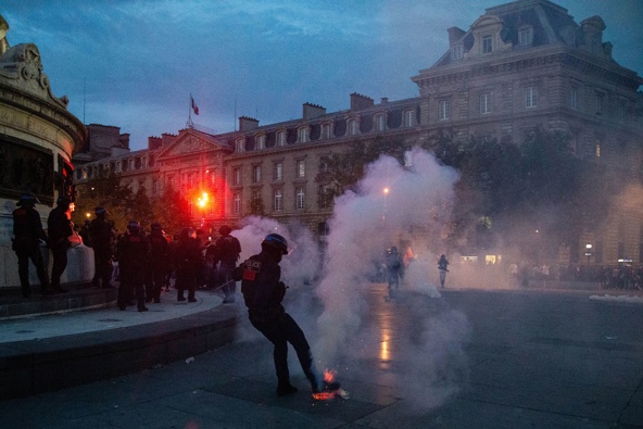 French riot police disperse demonstrators in Paris on October 12. (Photo / Getty)