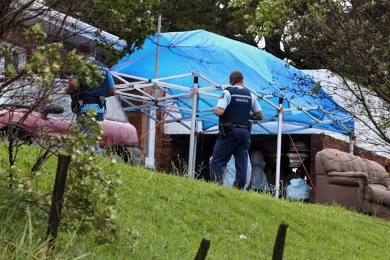 This 2014 photograph shows Police raiding the property where the meth lab was located, approximately 30km southwest of Whangarei. Photo / John Stone