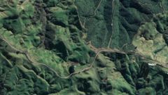 The rescue helicopter was called to Waihi Road near Tuai, where a woman had driven off a 50 metre bank. Photo / Google Maps