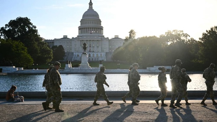 Members of the National Guard patrol along the grounds of the US Capitol on the first day of the US Government shutdown in Washington, DC. Photo / Brendan Smialowski, AFP