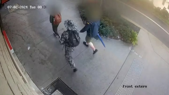 CCTV footage released by authorities shows the teenager wearing camouflage gear as he enters the university grounds.