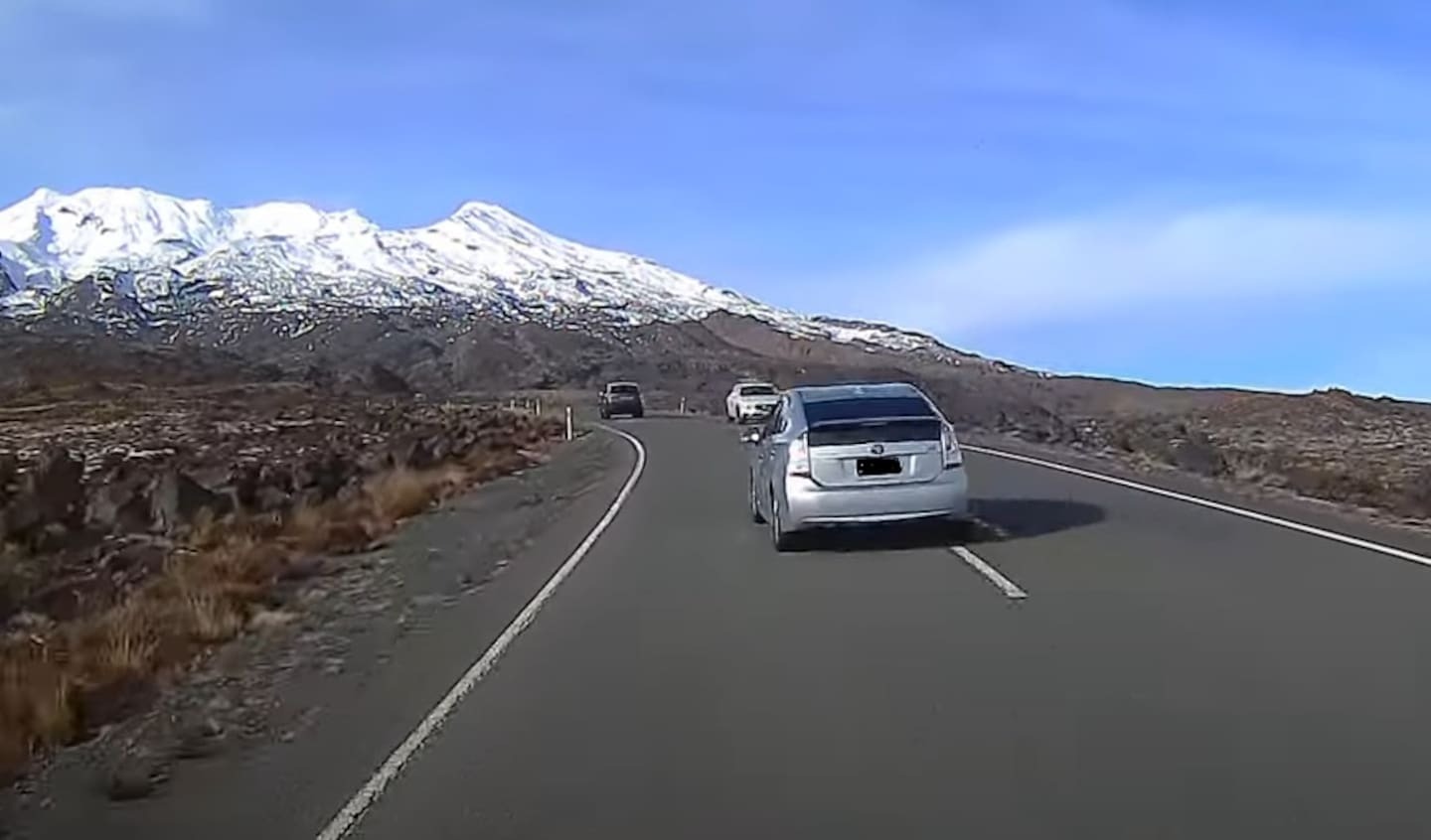 The second vehicle to pass the shuttle is still returning to the left lane as the oncoming traffic approaches - but a third vehicle is also attempting to pass. Photo / Supplied