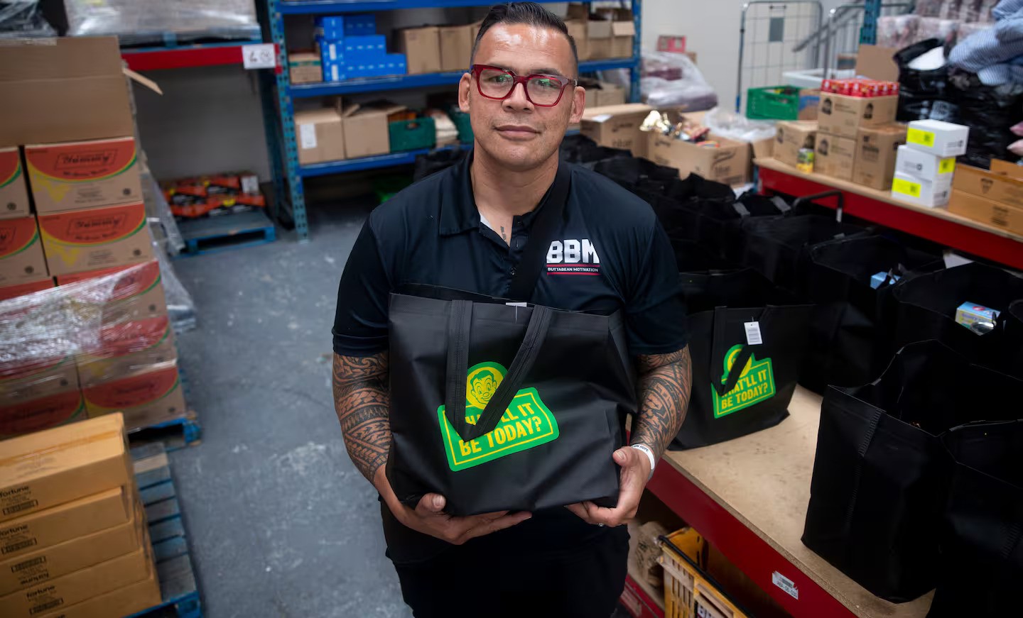 Community leader Dave Letele at work at his food bank in Mangere where he is supporting people who were effected by the Auckland floods. Photo / Dean Purcell.