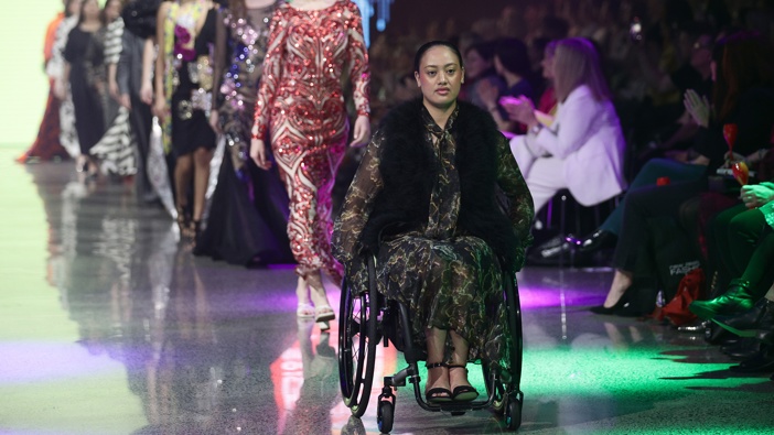 A model walks the runway during Resene Designer Runway at New Zealand Fashion Week 2023. Photo / Dave Rowland | Getty Images for NZFW)