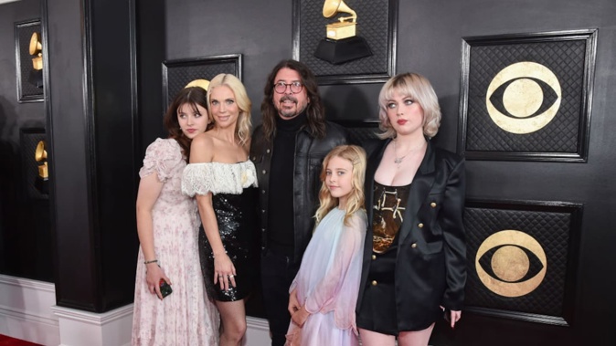 Dave Grohl, his wife Jordyn Blum, and daughters Violet, Harper and Ophelia attended the Grammys together in 2023. Photo / Getty Images
