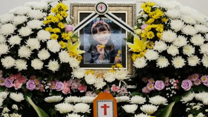 A memorial for the slain student.