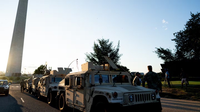 Members of the Washington DC National Guard are shown on Jefferson Drive SW during the week. President Donald Trump held a news conference the previous day in which he said DC was marked by "complete and total lawlessness". Photo / Peter W. Stevenson, The Washington Post