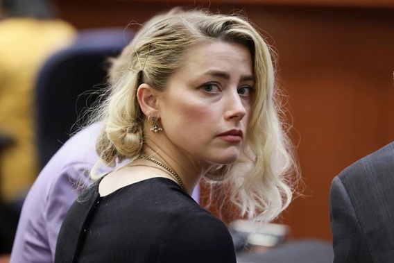 Amber Heard does not regret bringing her case against ex-husband Johnny Depp, she says. (Photo / AP)