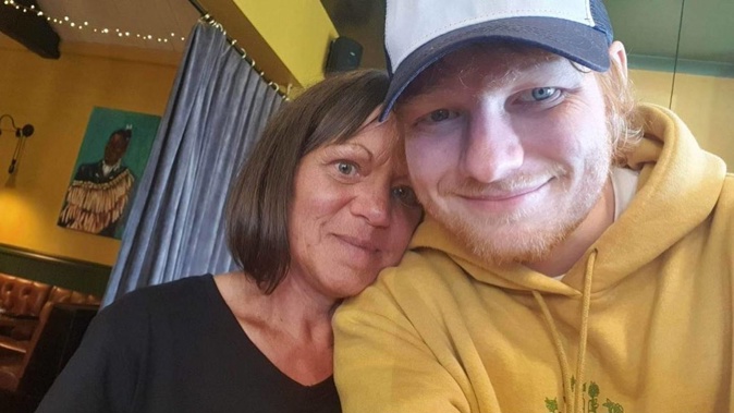 Featherston local Debbie Sinclair got to meet her idol Ed Sheeran after he made a surprise visit to the Brac and Bow restaurant and pub for a pint on Sunday. Photo / Brac and Bow / Facebook