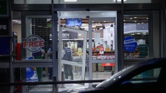 Offenders broke through the front door of Woolworths on Barry's Point Rd in Takapuna around 1.30am. Photo / Hayden Woodward