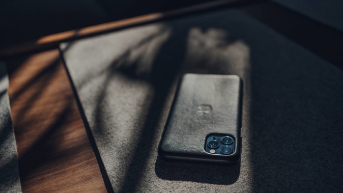 The boy left the phone on the desk inside before he left the classroom to play. Photo / 123RF