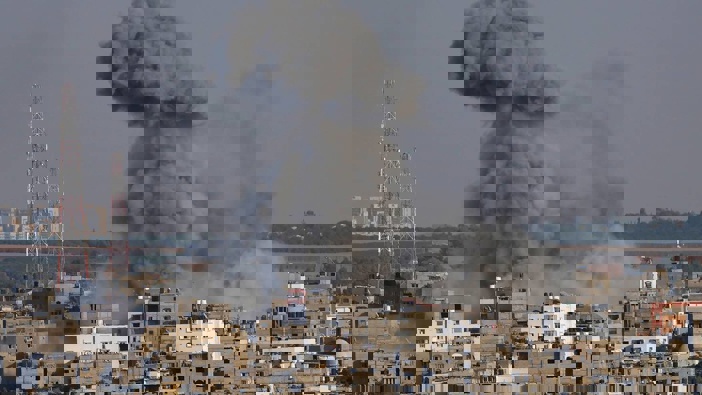 Smoke rises after Israeli airstrikes on a residential building in Gaza. Photo / Adel Hana, AP