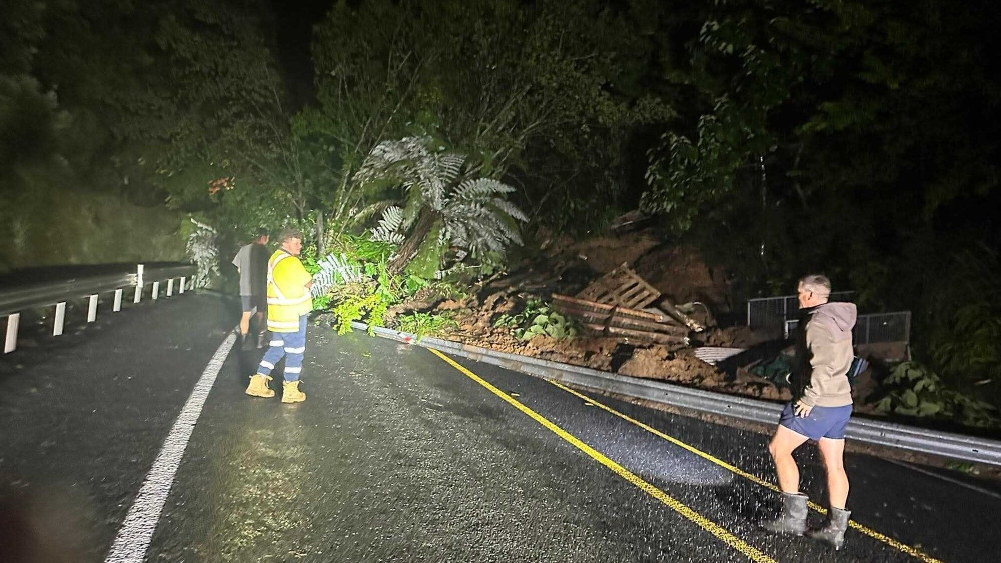 One hurt, two missing after slip smashes home; Rooftop rescue as water rises