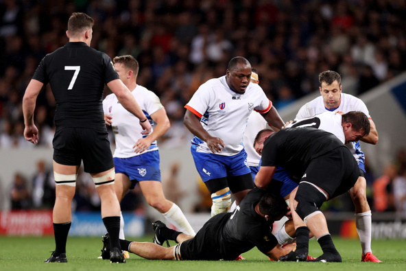 Adriaan Booysen of Namibia is tackled by Ethan de Groot of New Zealand, later resulting in a red card for de Groot. Photo / Getty