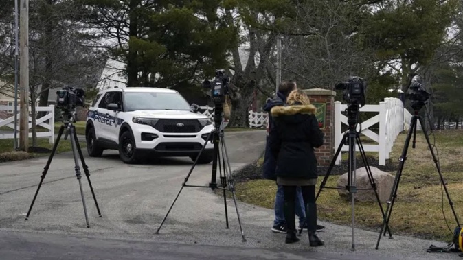Police secure the entrance to the neighbourhood of former Vice President Mike Pence's Indiana home. Photo / AP